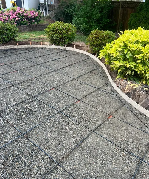 Broom finish patio and decorative borders in Covington 